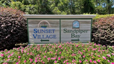 **TURN-KEY COASTAL CONDO IN SUNSET VILLAGE-FULLY FURNISHED-POND on Sandpiper Bay Golf and Country Club in North Carolina - for sale on GolfHomes.com, golf home, golf lot