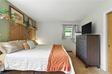 This stunning 4-bedroom, 3-bath home blends mid-century charm on James River Country Club in Virginia - for sale on GolfHomes.com, golf home, golf lot
