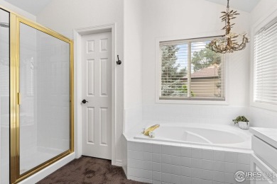 Tucked away on a beautiful professionally landscaped corner on Ptarmigan Golf Course in Colorado - for sale on GolfHomes.com, golf home, golf lot