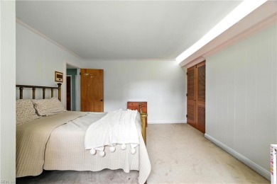 This stunning 4-bedroom, 3-bath home blends mid-century charm on James River Country Club in Virginia - for sale on GolfHomes.com, golf home, golf lot