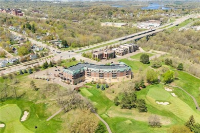Welcome to your exquisite 1-bedroom, 1-bathroom luxury condo on Eau Claire Golf and Country Club in Wisconsin - for sale on GolfHomes.com, golf home, golf lot