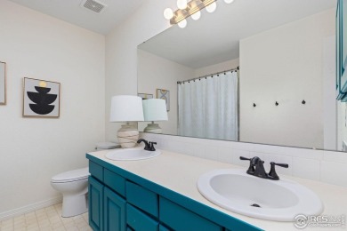 Tucked away on a beautiful professionally landscaped corner on Ptarmigan Golf Course in Colorado - for sale on GolfHomes.com, golf home, golf lot