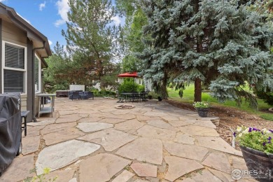Tucked away on a beautiful professionally landscaped corner on Ptarmigan Golf Course in Colorado - for sale on GolfHomes.com, golf home, golf lot