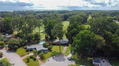 This stunning 4-bedroom, 3-bath home blends mid-century charm on James River Country Club in Virginia - for sale on GolfHomes.com, golf home, golf lot