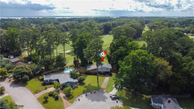 This stunning 4-bedroom, 3-bath home blends mid-century charm on James River Country Club in Virginia - for sale on GolfHomes.com, golf home, golf lot