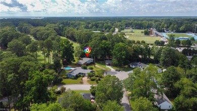 This stunning 4-bedroom, 3-bath home blends mid-century charm on James River Country Club in Virginia - for sale on GolfHomes.com, golf home, golf lot