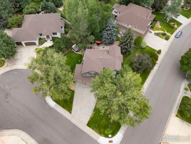 Tucked away on a beautiful professionally landscaped corner on Ptarmigan Golf Course in Colorado - for sale on GolfHomes.com, golf home, golf lot