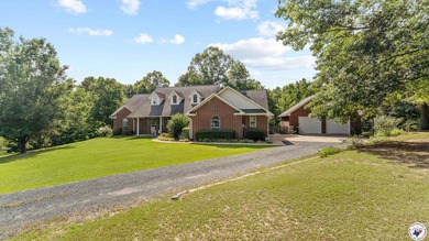 Tucked away on 3 private acres along the golf course, this on De Queen Country Club and Lodge in Arkansas - for sale on GolfHomes.com, golf home, golf lot