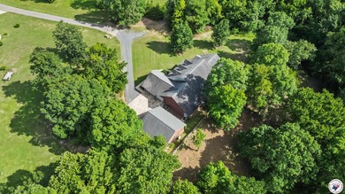 Tucked away on 3 private acres along the golf course, this on De Queen Country Club and Lodge in Arkansas - for sale on GolfHomes.com, golf home, golf lot