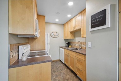Prime location near Cedarholm Golf Course! This updated 2-bed on Roseville-Cedarholm Golf Club in Minnesota - for sale on GolfHomes.com, golf home, golf lot