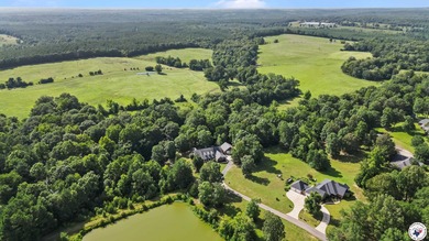 Tucked away on 3 private acres along the golf course, this on De Queen Country Club and Lodge in Arkansas - for sale on GolfHomes.com, golf home, golf lot
