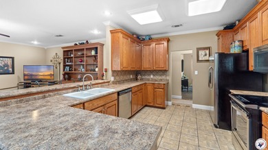 Tucked away on 3 private acres along the golf course, this on De Queen Country Club and Lodge in Arkansas - for sale on GolfHomes.com, golf home, golf lot