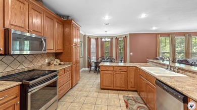 Tucked away on 3 private acres along the golf course, this on De Queen Country Club and Lodge in Arkansas - for sale on GolfHomes.com, golf home, golf lot