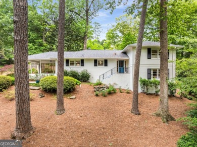 Nestled on a large 3/4+ acre serene, corner lot in the highly on Bobby Jones Golf Club in Georgia - for sale on GolfHomes.com, golf home, golf lot