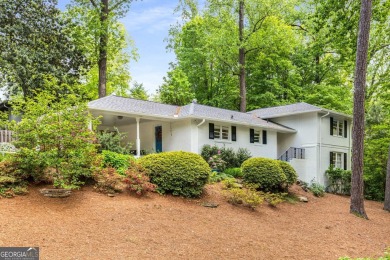 Nestled on a large 3/4+ acre serene, corner lot in the highly on Bobby Jones Golf Club in Georgia - for sale on GolfHomes.com, golf home, golf lot