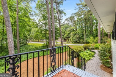 Nestled on a large 3/4+ acre serene, corner lot in the highly on Bobby Jones Golf Club in Georgia - for sale on GolfHomes.com, golf home, golf lot