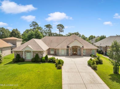 RELISTED WITH A WHOLE NEW LOOK !Located in the highly sought on Diamondhead Country Club in Mississippi - for sale on GolfHomes.com, golf home, golf lot