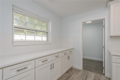 Welcome to 1152 Jackmar Road, a completely renovated 2000sf+ on The Dunedin Country Club in Florida - for sale on GolfHomes.com, golf home, golf lot