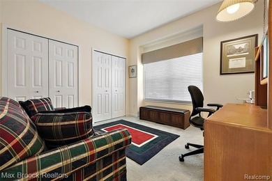 Welcome home to this charming detached colonial-style condo in on The Maples Club in Michigan - for sale on GolfHomes.com, golf home, golf lot