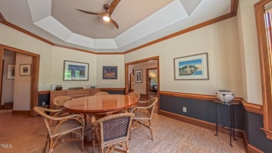 Welcome to an exceptional one-level estate nestled in the on Governors Club in North Carolina - for sale on GolfHomes.com, golf home, golf lot