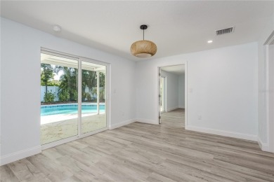 Welcome to 1152 Jackmar Road, a completely renovated 2000sf+ on The Dunedin Country Club in Florida - for sale on GolfHomes.com, golf home, golf lot