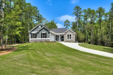 Nestled within the prestigious Savannah Lakes Village, this on Tara Golf Club At Savannah Lakes in South Carolina - for sale on GolfHomes.com, golf home, golf lot