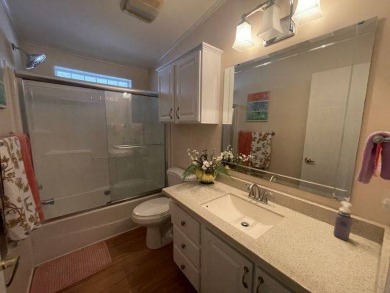 HUGE PRICE REDUCTION ~ SAVE $14,900! This spacious home offers on Four Lakes Golf Club in Florida - for sale on GolfHomes.com, golf home, golf lot