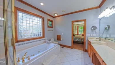 Welcome to an exceptional one-level estate nestled in the on Governors Club in North Carolina - for sale on GolfHomes.com, golf home, golf lot