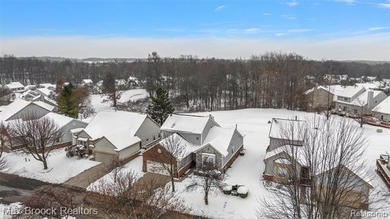Welcome home to this charming detached colonial-style condo in on The Maples Club in Michigan - for sale on GolfHomes.com, golf home, golf lot