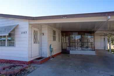 Short Sale. Welcome home to this unique single-wide manufactured on Orange Blossom Hills Golf and Country Club in Florida - for sale on GolfHomes.com, golf home, golf lot