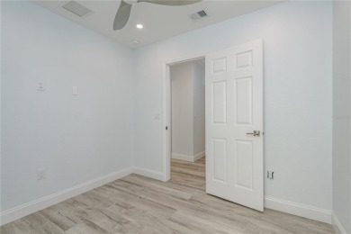Welcome to 1152 Jackmar Road, a completely renovated 2000sf+ on The Dunedin Country Club in Florida - for sale on GolfHomes.com, golf home, golf lot