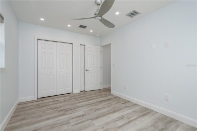 Welcome to 1152 Jackmar Road, a completely renovated 2000sf+ on The Dunedin Country Club in Florida - for sale on GolfHomes.com, golf home, golf lot