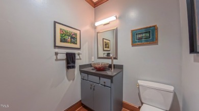 Welcome to an exceptional one-level estate nestled in the on Governors Club in North Carolina - for sale on GolfHomes.com, golf home, golf lot