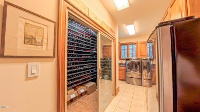 Welcome to an exceptional one-level estate nestled in the on Governors Club in North Carolina - for sale on GolfHomes.com, golf home, golf lot