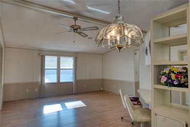 Short Sale. Welcome home to this unique single-wide manufactured on Orange Blossom Hills Golf and Country Club in Florida - for sale on GolfHomes.com, golf home, golf lot