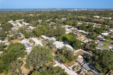 Welcome to 1152 Jackmar Road, a completely renovated 2000sf+ on The Dunedin Country Club in Florida - for sale on GolfHomes.com, golf home, golf lot