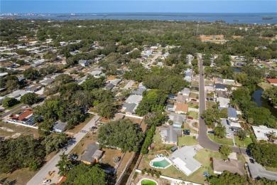 Welcome to 1152 Jackmar Road, a completely renovated 2000sf+ on The Dunedin Country Club in Florida - for sale on GolfHomes.com, golf home, golf lot