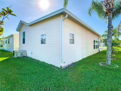 Step into this well-cared-for home where pride of ownership is on Lily Lake Golf and RV Resort in Florida - for sale on GolfHomes.com, golf home, golf lot