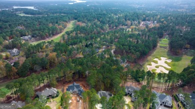 Indulge in opulent living within this custom 5-bedroom, 5.5-bath on Reynolds Lake Oconee - The Oconee in Georgia - for sale on GolfHomes.com, golf home, golf lot