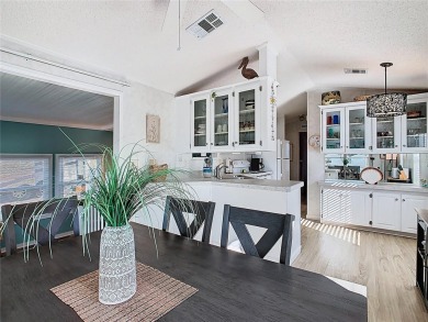 Step into this well-cared-for home where pride of ownership is on Lily Lake Golf and RV Resort in Florida - for sale on GolfHomes.com, golf home, golf lot