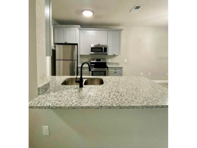 Beautiful remodeled ground floor apartment, with laminate on Southern Dunes Golf and Country Club in Florida - for sale on GolfHomes.com, golf home, golf lot