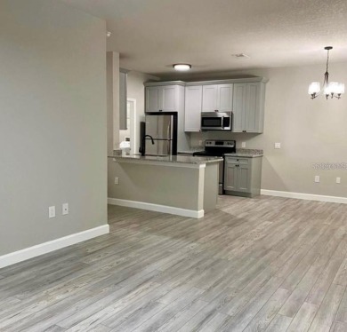 Beautiful remodeled ground floor apartment, with laminate on Southern Dunes Golf and Country Club in Florida - for sale on GolfHomes.com, golf home, golf lot