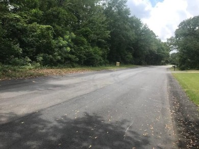 This large wooded lot is ready for you to build your dream home on Sweetwater Country Club in South Carolina - for sale on GolfHomes.com, golf home, golf lot