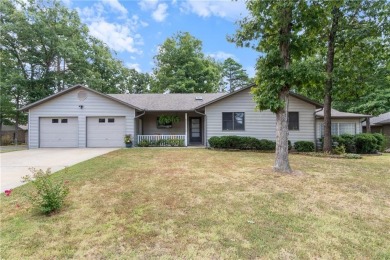 This beautifully updated home is on the 3rd green of a pristine on Holiday Island Golf Course in Arkansas - for sale on GolfHomes.com, golf home, golf lot