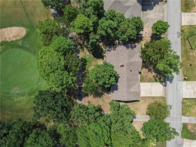 This beautifully updated home is on the 3rd green of a pristine on Holiday Island Golf Course in Arkansas - for sale on GolfHomes.com, golf home, golf lot