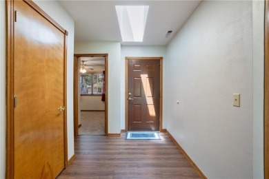 This beautifully updated home is on the 3rd green of a pristine on Holiday Island Golf Course in Arkansas - for sale on GolfHomes.com, golf home, golf lot