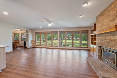 This beautifully updated home is on the 3rd green of a pristine on Holiday Island Golf Course in Arkansas - for sale on GolfHomes.com, golf home, golf lot