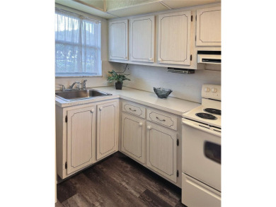 First floor 1 Bed/1 Bath located in the 55+ community of Sunrise on Sunrise Lakes Phase IV Golf Course in Florida - for sale on GolfHomes.com, golf home, golf lot