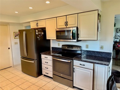 You'll truly have it *made in the shade* in this gorgeous condo on Falcon Watch Golf Club in Florida - for sale on GolfHomes.com, golf home, golf lot