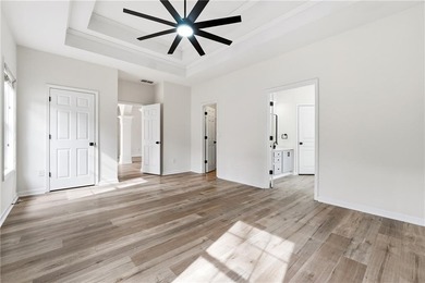 Welcome home to this beautifully renovated 4-bedroom, 2-bath on Trophy Club of Apalachee in Georgia - for sale on GolfHomes.com, golf home, golf lot